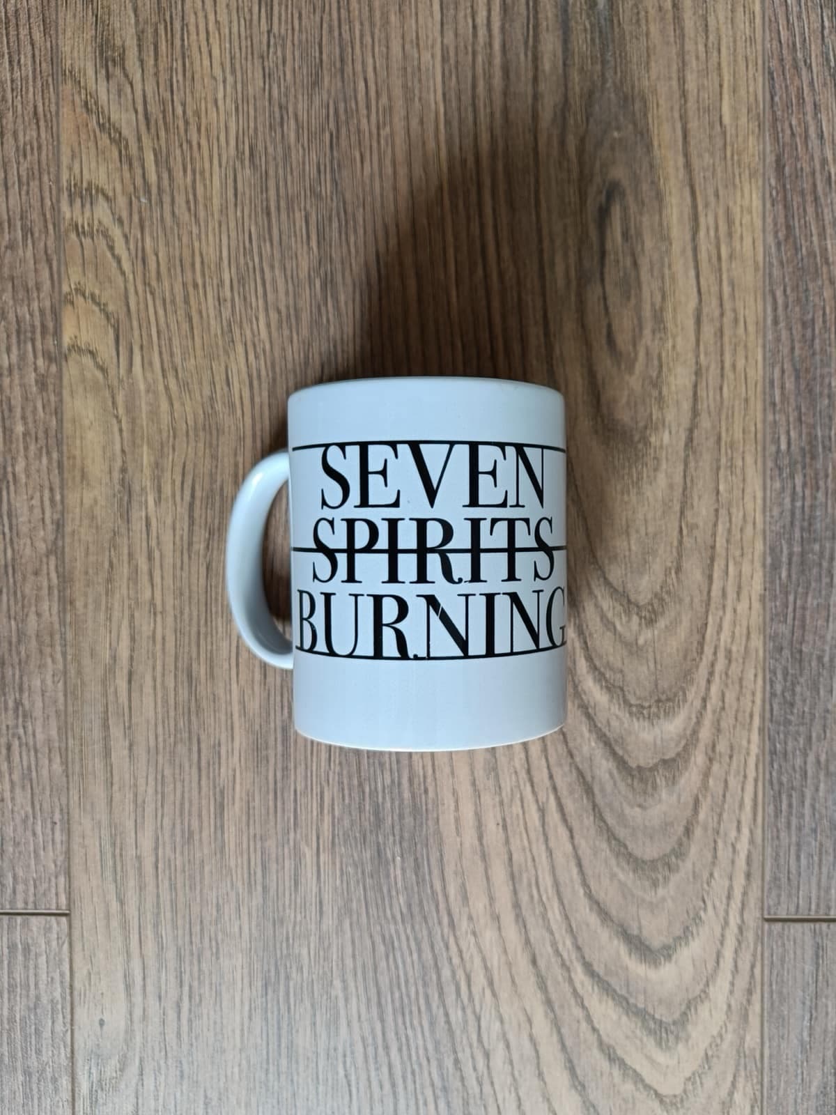 Seven Spirits Burning ceramic mug, three-quarter view